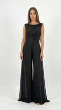 Mono Elegante con Capa de Gasa y Top de Lentejuelas Negro